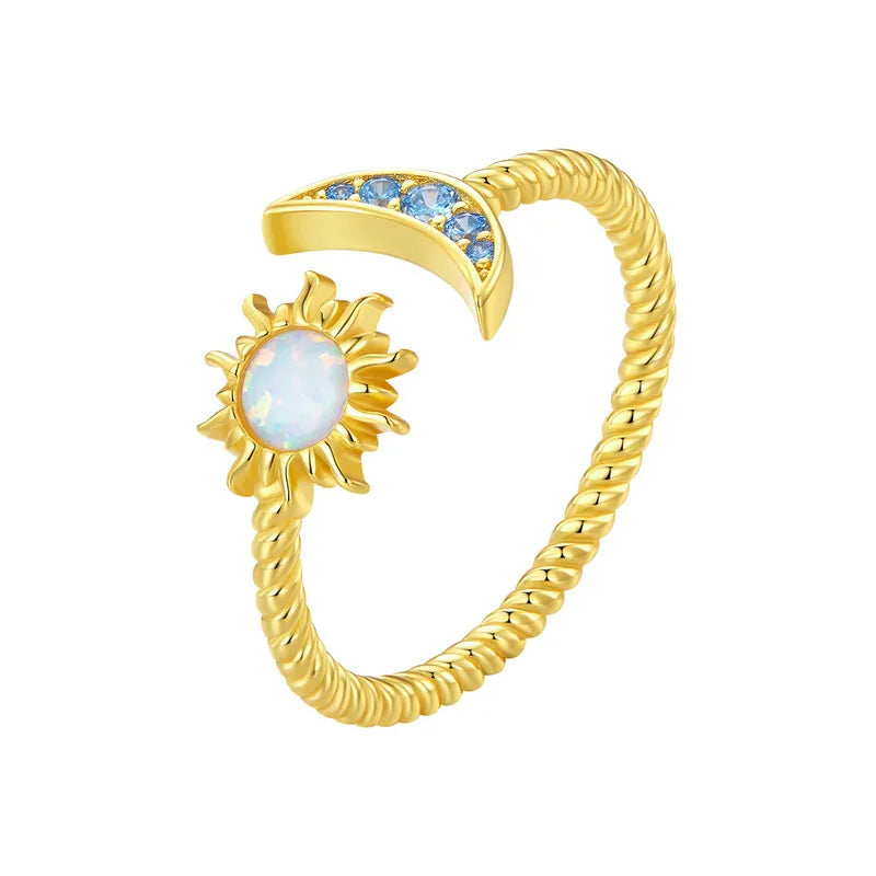 Sun & moon open ring

❤ The twisted oxidized silver open ring with a moon inlaid with blue zircon and a sun inlaid with beautiful opal is exquisitely shining and full of romantic charm.